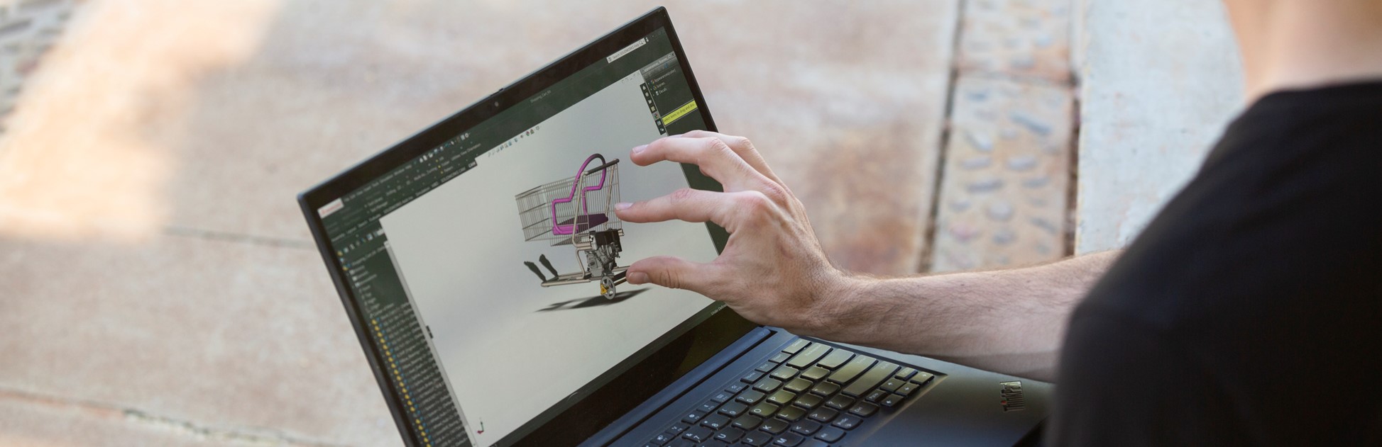 Student using CAD software on laptop computer